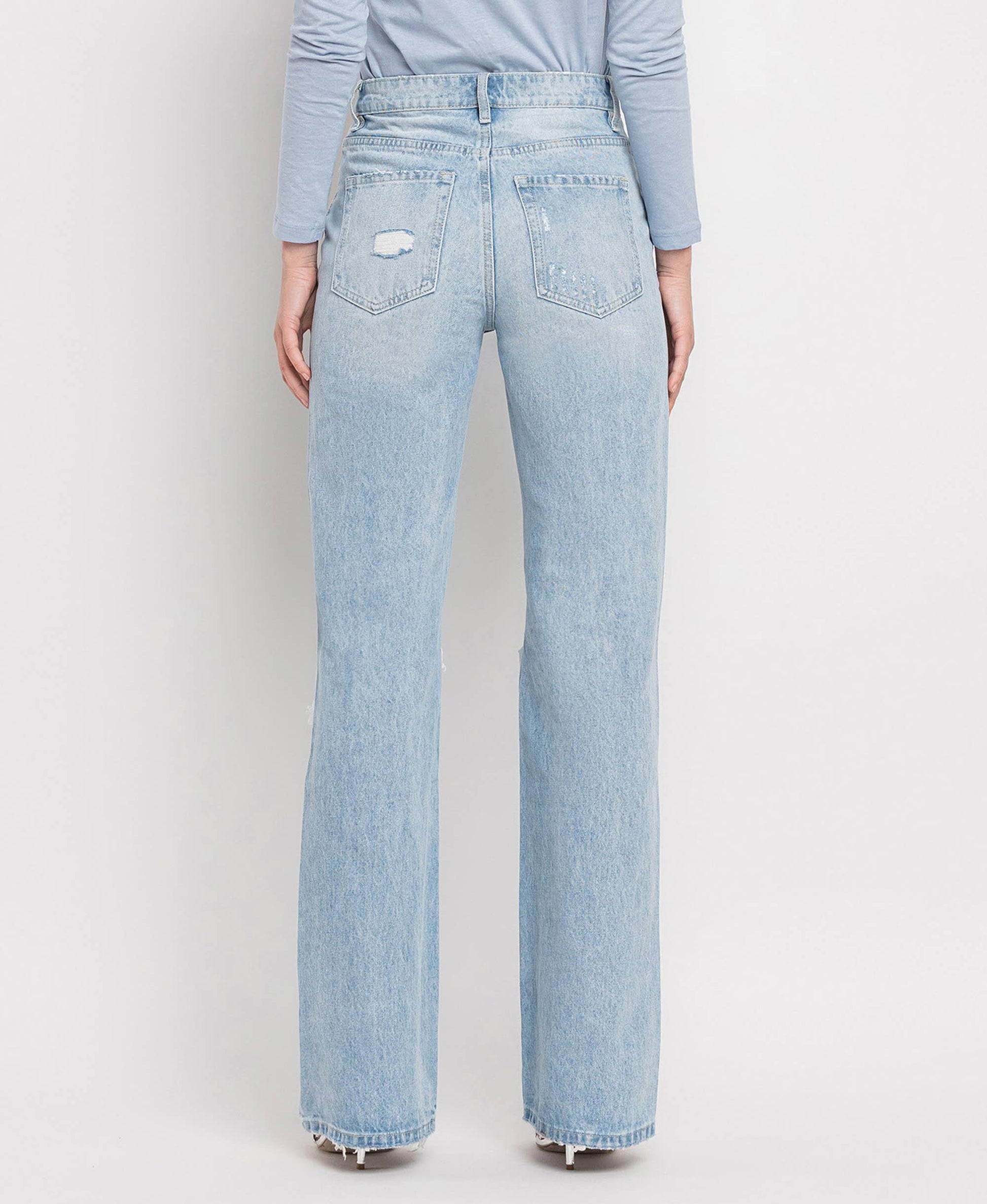 VERVET by Flying Monkey Super High Rise Flare Jeans in Sunny Plains — back view showing distressed back pockets and finished flare hem