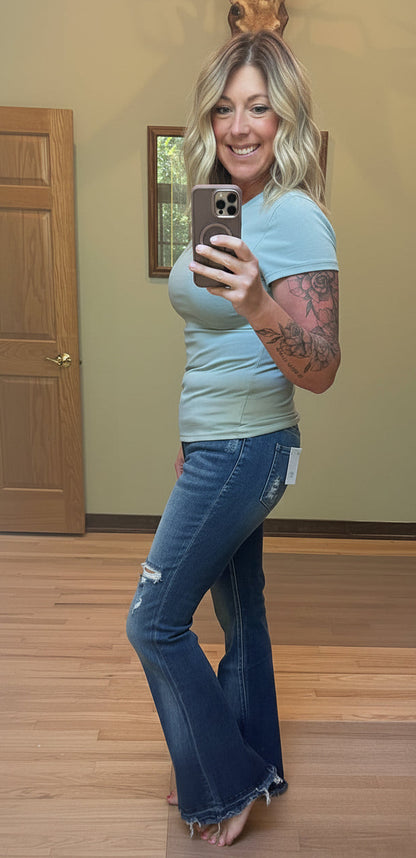 VERVET by Flying Monkey High Rise Distressed Flare Jeans showing distressed detail and reversed patch, side view