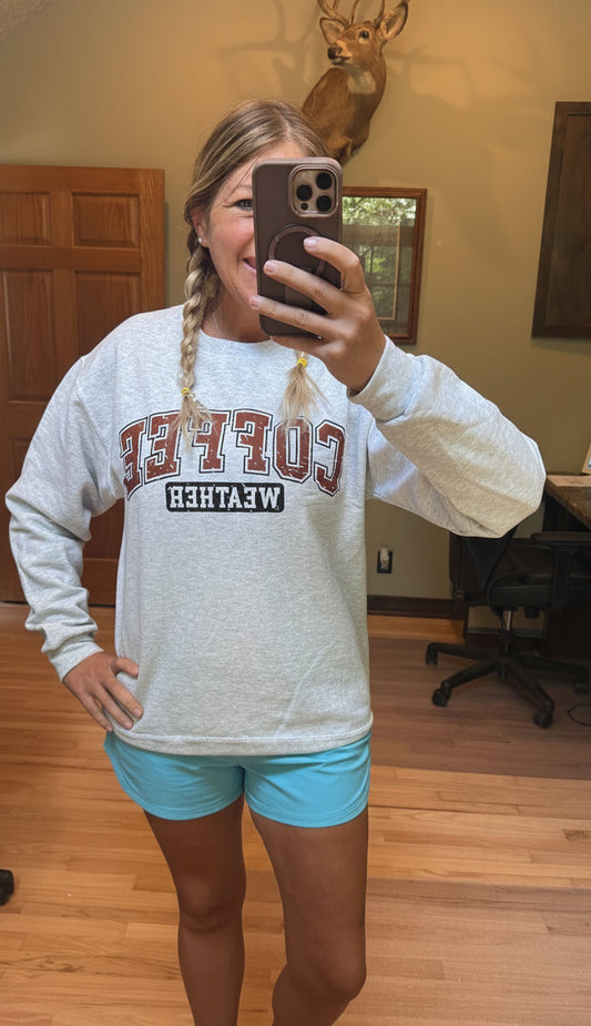 Bob & Keek Coffee Weather Sweatshirt in Ash Grey worn with light blue shorts — relaxed fit crewneck with Coffee Weather graphic
