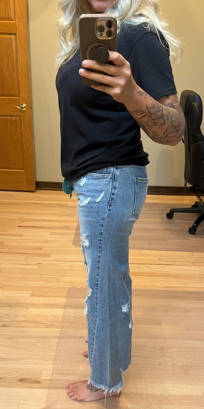 Brooke wearing Blakeley Drew distressed wide leg dad jeans in light wash size 1, side view showing mid-high rise waist and wide leg silhouette

