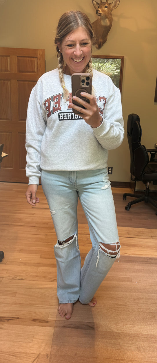Brooke wearing VERVET by Flying Monkey 90's Vintage Flare Jeans in Sunny Plains light wash, size 27 — full length front view with distressed knee detail
