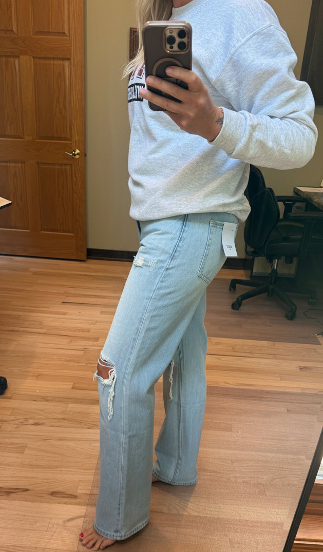 VERVET by Flying Monkey Super High Rise Flare Jeans in Sunny Plains light wash — side view showing super high rise waist and wide flare leg opening